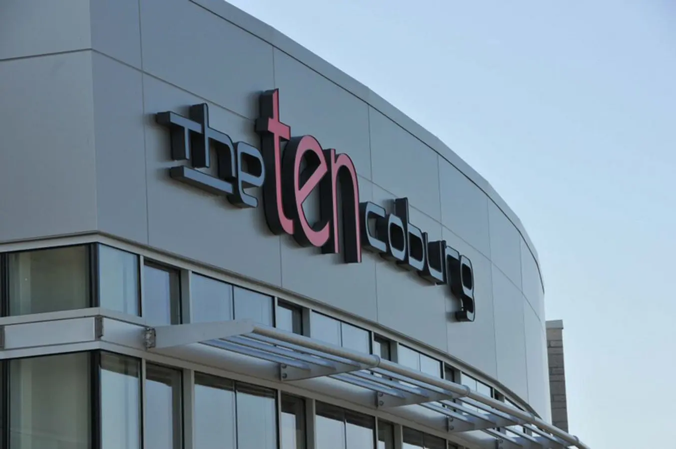 The Dental Loft logo on exterior building signage at their Eugene dental practice location.